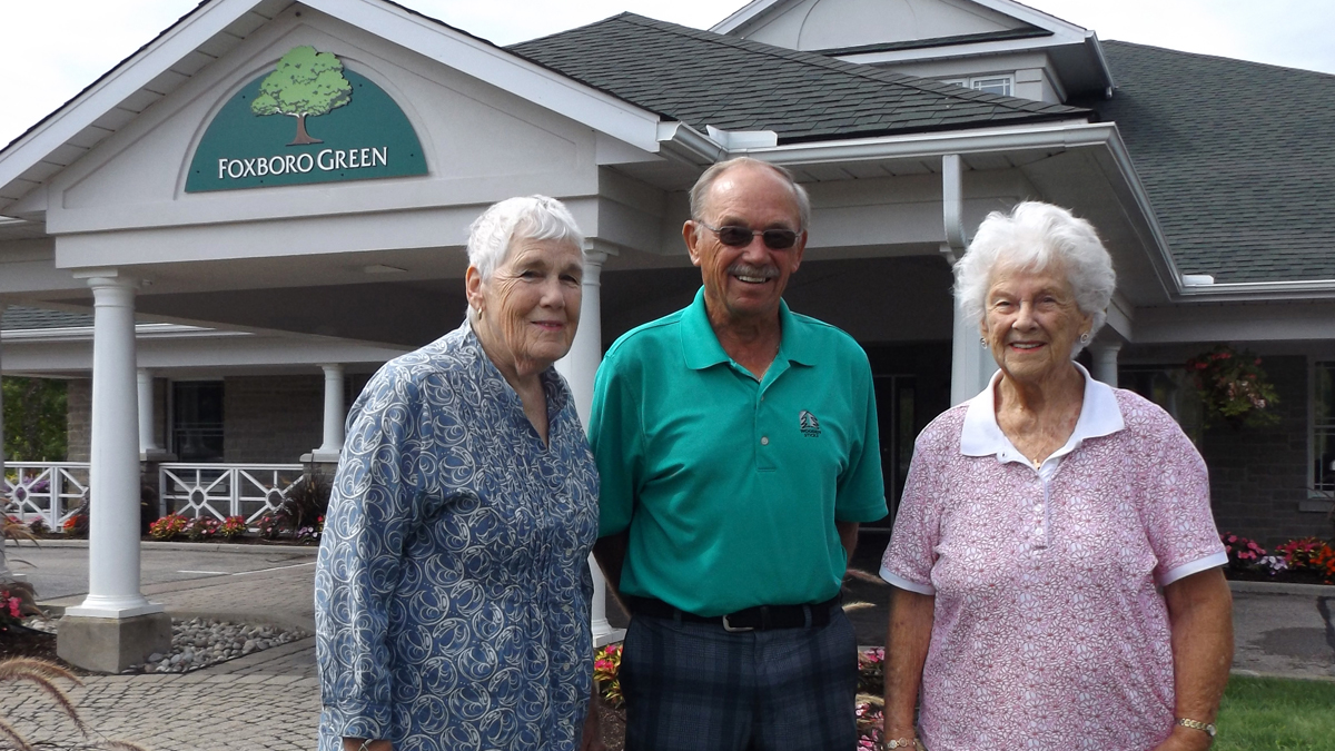 Firm Foxboro friends Margaret Lewis-Macdonald, Jim Arbuckle and Joan Roberts outside the condo community’s recreation centre.